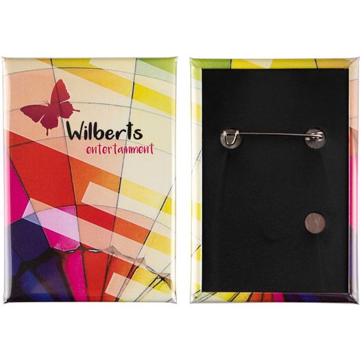 Produktabbildung Metallbutton 78x53mm rechteckig Hinterseite mit vertikalen Nadel Metallbutton 78x53mm rechteckig Hinterseite mit vertikalen Nadel (Bild 1)