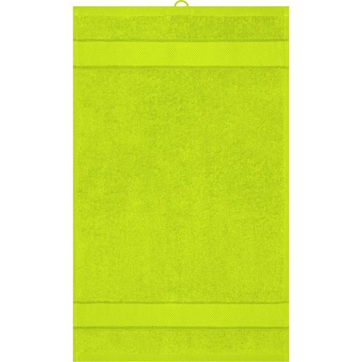 ein kalk-grünes handtuch auf einer weißen wand Guest Towel - Gästehandtuch im modischen Design (Bild 1)