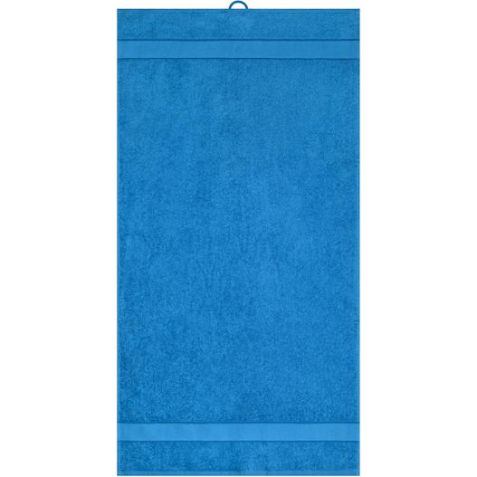 ein blaues handtuch, das an einer wand hängt Hand Towel - Handtuch im modischen Design (Bild 1)