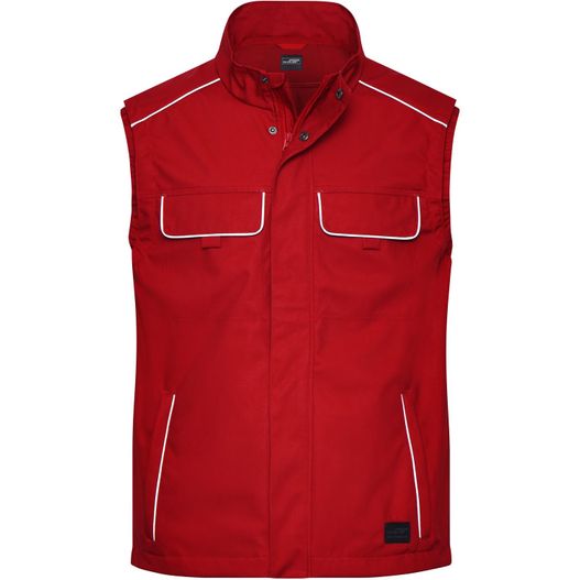 eine rote weste mit weißen pips und taschen Workwear Softshell Light Vest - SOLID - - Professionelle, leichte Softshellweste im cleanen Look mit hochwertigen Details (Bild 1)