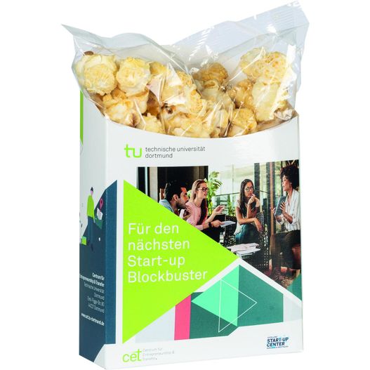 eine tasche von essen, die auf einem tisch sitzt Popcorn to go (Bild 1)
