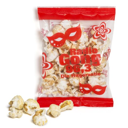 eine tasche aus popcorn mit einem roten bogen darauf Popcorn (Bild 1)