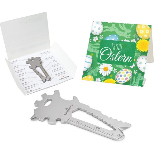 eine box mit einem schlüssel und einer karte mit einem bild einer person ROMINOX® Key Tool Lion (22 Funktionen) Frohe Ostern (Bild 1)
