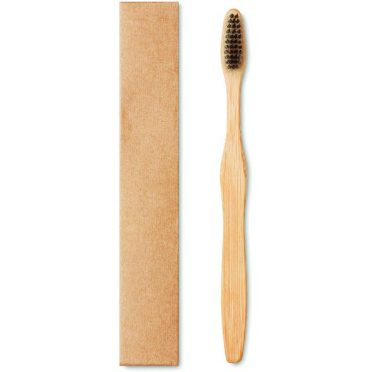 eine holzzahnbürste neben einem karton Zahnbürste Bambus DENTOBRUSH (Bild 1)