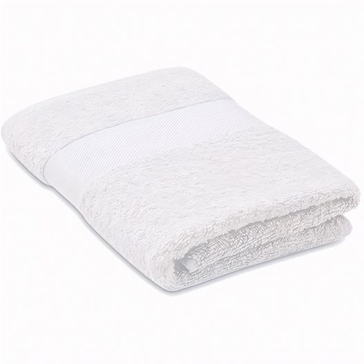 ein weißes handtuch auf einem weißen tisch gefaltet Handtuch Organic Cotton TERRY (Bild 1)
