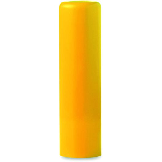 eine gelbe kerze sitzt auf einer weißen oberfläche Lippenbalsam GLOSS (Bild 1)