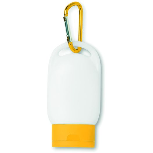 ein gelber karabiner, der an einer weißen wand hängt Sonnencreme SUNCARE (Bild 1)