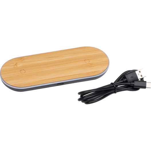 ein holzgerät mit einem ladegerät und einem kabel Induktionsladestation Nassau (Bild 1)