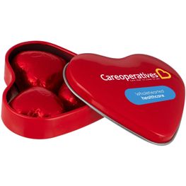 Herzförmige Dose mit Schokoladenherzen