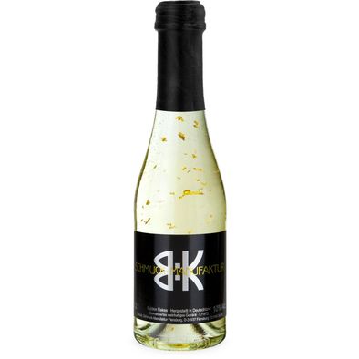 Produktabbildung Piccolo Golden Flakes - Fl. klar - Kapsel schwarz, 0,2 l Piccolo Golden Flakes - Fl. klar - Kapsel schwarz, 0,2 l