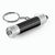 RE-LERGAN. Schlüsselanhänger aus Aluminium (92% recycelt) mit 3-Licht-LED-Taschenlampe